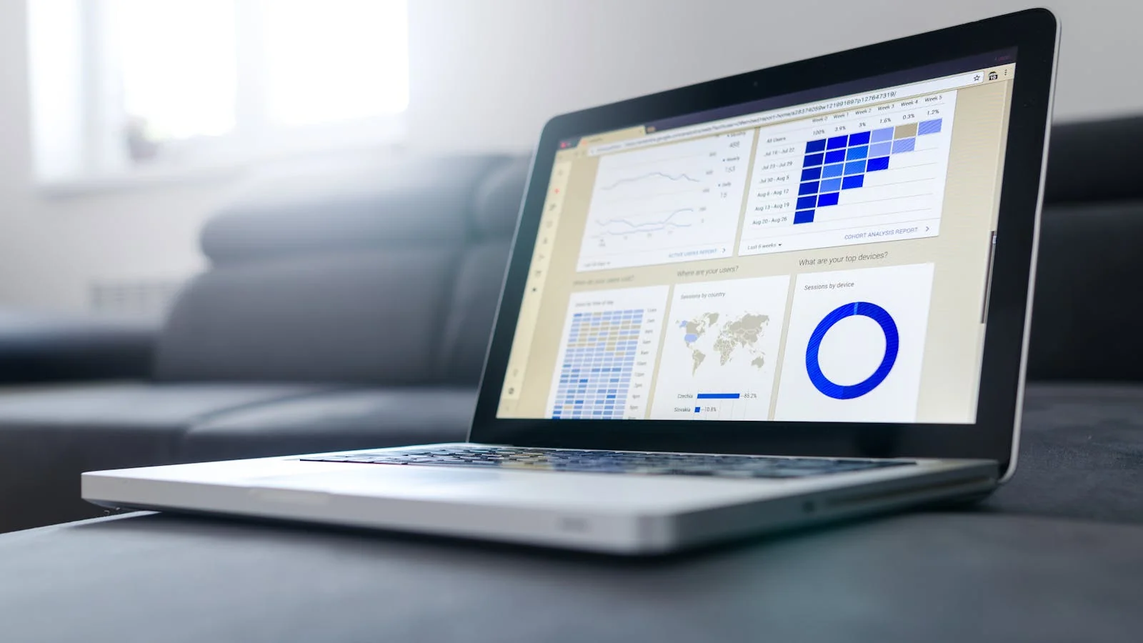 A laptop screen showing analytics charts, the kind of structured data AI engines extract.